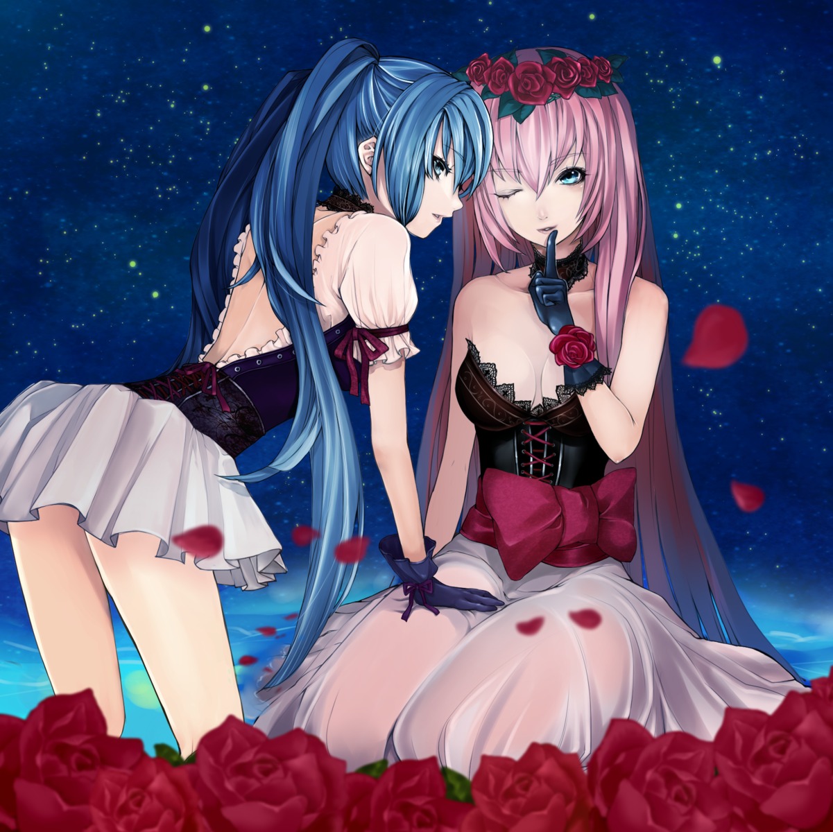 Две девушки с розовыми и голубыми волосами